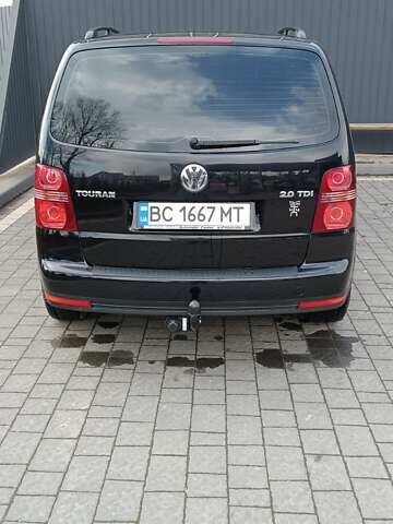 Черный Фольксваген Туран, объемом двигателя 2 л и пробегом 249 тыс. км за 8400 $, фото 1 на Automoto.ua