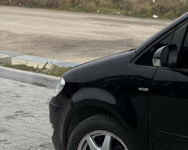 Черный Фольксваген Туран, объемом двигателя 1.4 л и пробегом 247 тыс. км за 7500 $, фото 7 на Automoto.ua