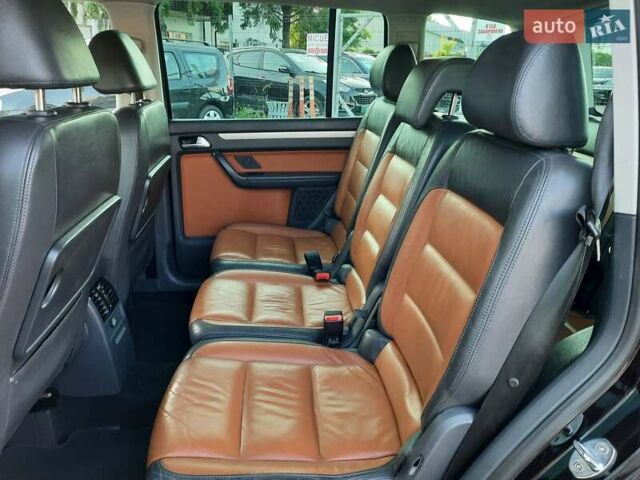 Черный Фольксваген Туран, объемом двигателя 1.6 л и пробегом 213 тыс. км за 8550 $, фото 80 на Automoto.ua