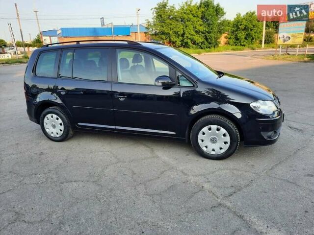 Черный Фольксваген Туран, объемом двигателя 1.6 л и пробегом 213 тыс. км за 8550 $, фото 24 на Automoto.ua