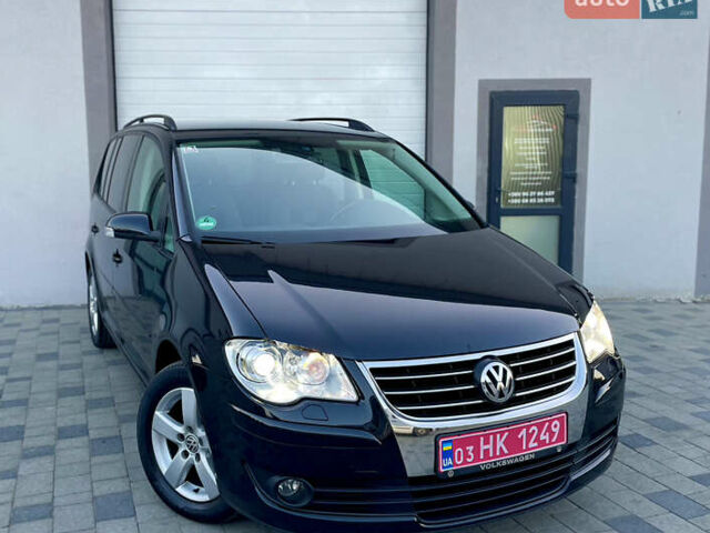 Чорний Фольксваген Туран, об'ємом двигуна 2 л та пробігом 292 тис. км за 8999 $, фото 5 на Automoto.ua