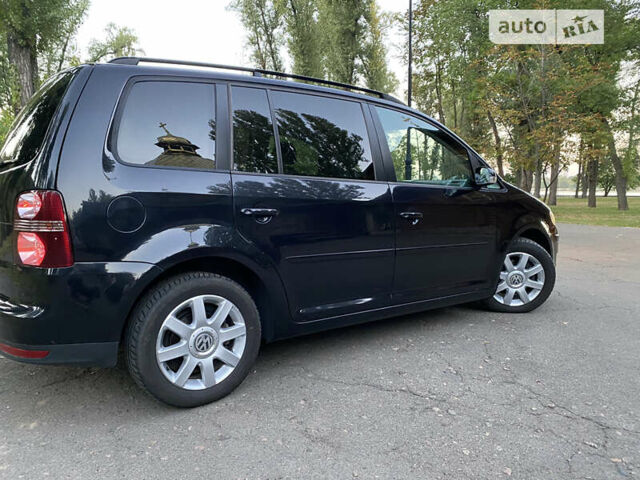 Черный Фольксваген Туран, объемом двигателя 1.6 л и пробегом 261 тыс. км за 7100 $, фото 27 на Automoto.ua