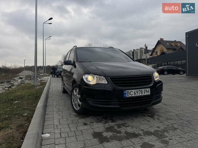 Черный Фольксваген Туран, объемом двигателя 1.4 л и пробегом 247 тыс. км за 7500 $, фото 2 на Automoto.ua