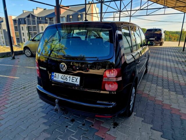 Черный Фольксваген Туран, объемом двигателя 1.6 л и пробегом 231 тыс. км за 5800 $, фото 7 на Automoto.ua