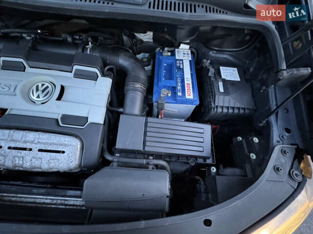 Черный Фольксваген Туран, объемом двигателя 1.4 л и пробегом 224 тыс. км за 6499 $, фото 48 на Automoto.ua