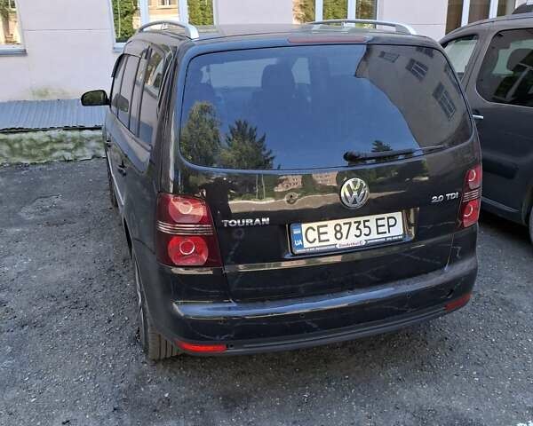 Черный Фольксваген Туран, объемом двигателя 1.98 л и пробегом 296 тыс. км за 7800 $, фото 18 на Automoto.ua