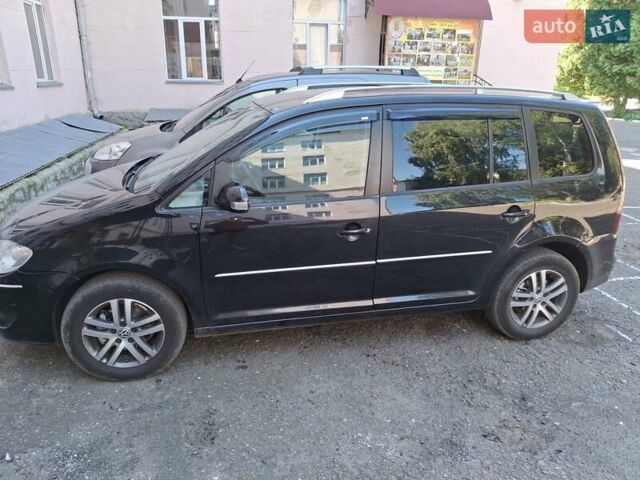 Черный Фольксваген Туран, объемом двигателя 1.98 л и пробегом 296 тыс. км за 7800 $, фото 7 на Automoto.ua