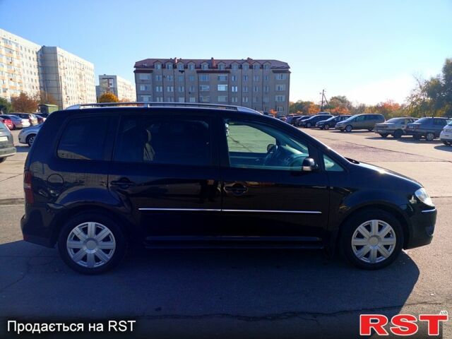 Черный Фольксваген Туран, объемом двигателя 1.4 л и пробегом 291 тыс. км за 6050 $, фото 3 на Automoto.ua