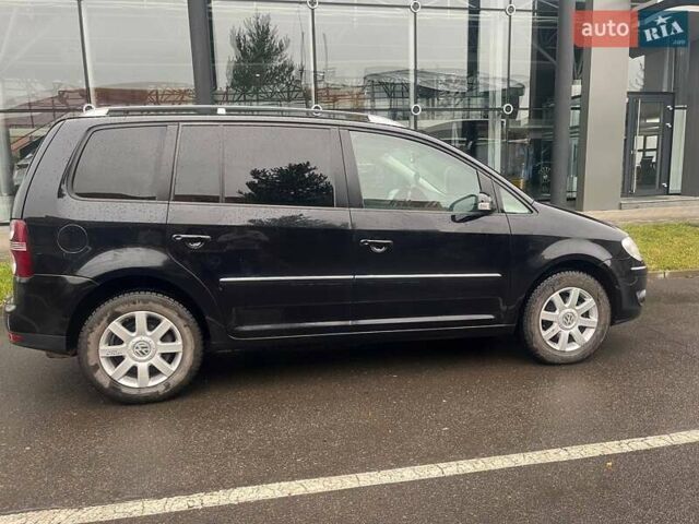 Черный Фольксваген Туран, объемом двигателя 2 л и пробегом 208 тыс. км за 7771 $, фото 5 на Automoto.ua