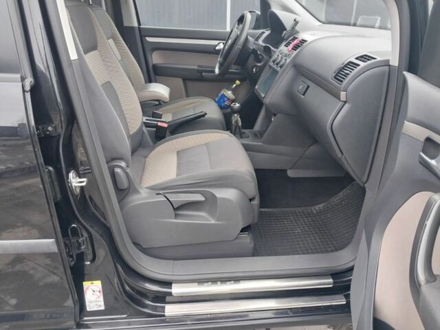 Черный Фольксваген Туран, объемом двигателя 2 л и пробегом 242 тыс. км за 6950 $, фото 17 на Automoto.ua