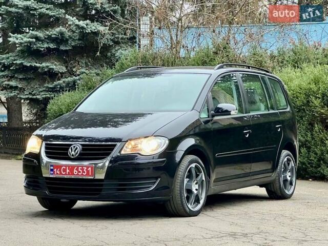 Чорний Фольксваген Туран, об'ємом двигуна 1.6 л та пробігом 221 тис. км за 7750 $, фото 1 на Automoto.ua