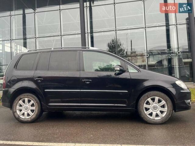 Черный Фольксваген Туран, объемом двигателя 2 л и пробегом 208 тыс. км за 7771 $, фото 14 на Automoto.ua