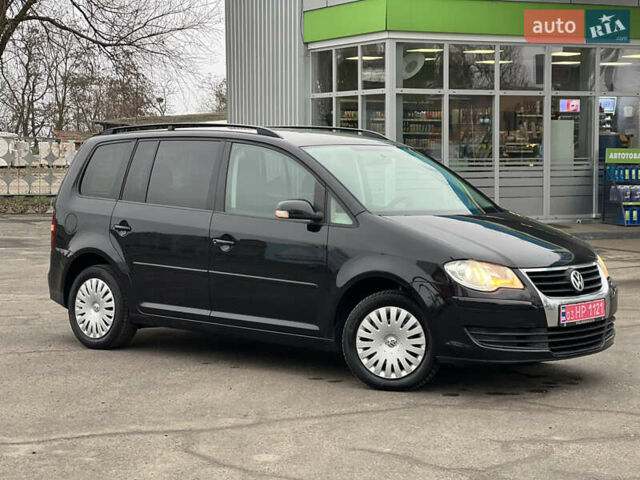 Черный Фольксваген Туран, объемом двигателя 1.6 л и пробегом 193 тыс. км за 7799 $, фото 11 на Automoto.ua