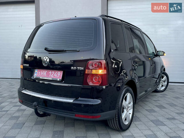 Чорний Фольксваген Туран, об'ємом двигуна 2 л та пробігом 292 тис. км за 8999 $, фото 36 на Automoto.ua