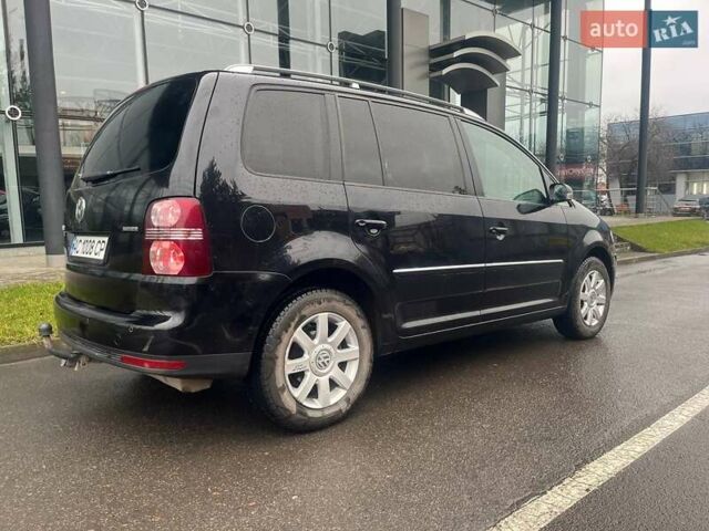 Черный Фольксваген Туран, объемом двигателя 2 л и пробегом 208 тыс. км за 7771 $, фото 16 на Automoto.ua