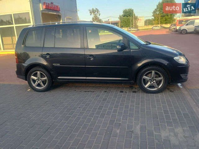 Черный Фольксваген Туран, объемом двигателя 2 л и пробегом 290 тыс. км за 6500 $, фото 1 на Automoto.ua