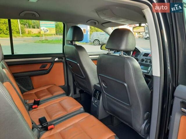 Черный Фольксваген Туран, объемом двигателя 1.6 л и пробегом 213 тыс. км за 8550 $, фото 133 на Automoto.ua