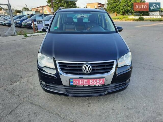 Черный Фольксваген Туран, объемом двигателя 1.6 л и пробегом 213 тыс. км за 8550 $, фото 4 на Automoto.ua