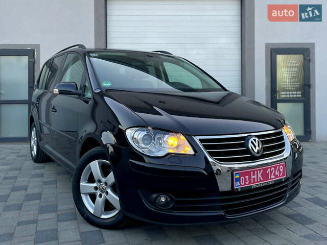 Чорний Фольксваген Туран, об'ємом двигуна 2 л та пробігом 292 тис. км за 8850 $, фото 12 на Automoto.ua