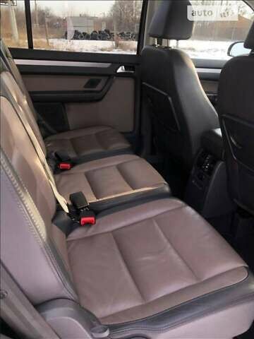 Черный Фольксваген Туран, объемом двигателя 1.39 л и пробегом 175 тыс. км за 9400 $, фото 1 на Automoto.ua