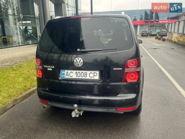 Черный Фольксваген Туран, объемом двигателя 2 л и пробегом 208 тыс. км за 7771 $, фото 8 на Automoto.ua