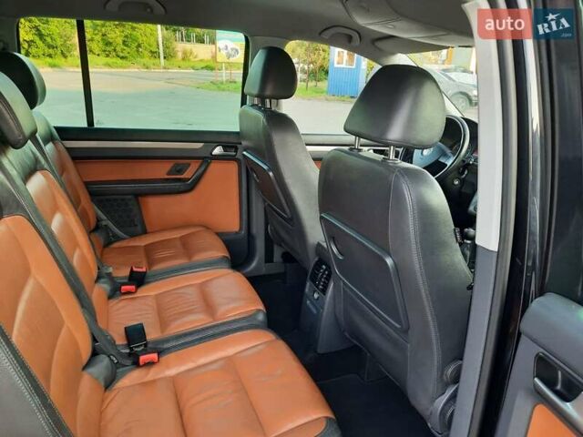 Черный Фольксваген Туран, объемом двигателя 1.6 л и пробегом 213 тыс. км за 8550 $, фото 132 на Automoto.ua