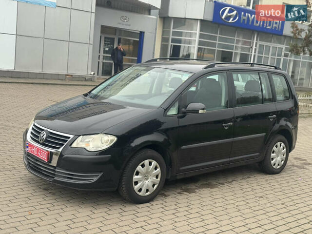 Чорний Фольксваген Туран, об'ємом двигуна 1.6 л та пробігом 260 тис. км за 6299 $, фото 3 на Automoto.ua