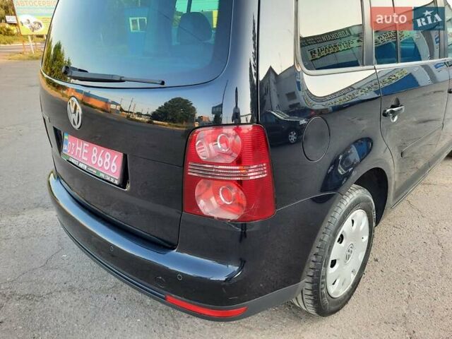 Черный Фольксваген Туран, объемом двигателя 1.6 л и пробегом 213 тыс. км за 8550 $, фото 109 на Automoto.ua
