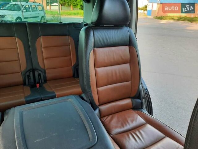 Черный Фольксваген Туран, объемом двигателя 1.6 л и пробегом 213 тыс. км за 8550 $, фото 104 на Automoto.ua