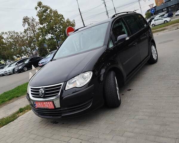 Чорний Фольксваген Туран, об'ємом двигуна 1.4 л та пробігом 194 тис. км за 6600 $, фото 1 на Automoto.ua