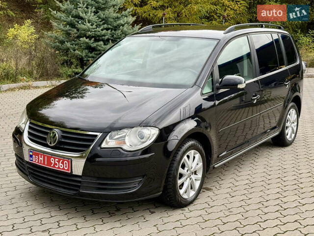 Черный Фольксваген Туран, объемом двигателя 1.6 л и пробегом 200 тыс. км за 7700 $, фото 4 на Automoto.ua
