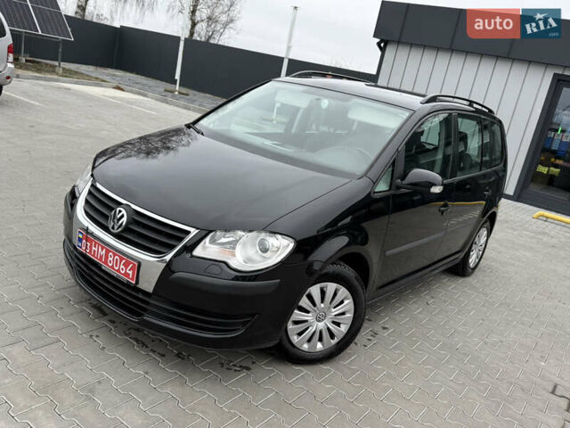 Черный Фольксваген Туран, объемом двигателя 1.4 л и пробегом 227 тыс. км за 7200 $, фото 72 на Automoto.ua