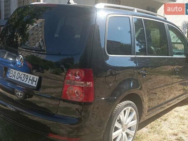 Черный Фольксваген Туран, объемом двигателя 1.39 л и пробегом 175 тыс. км за 9400 $, фото 6 на Automoto.ua