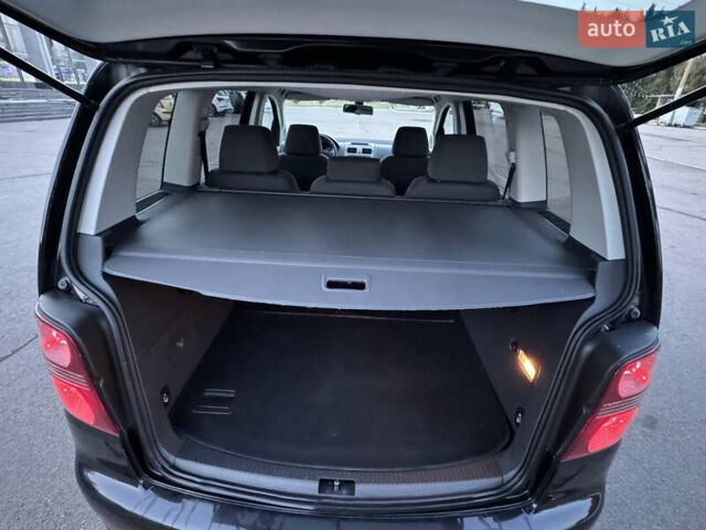 Черный Фольксваген Туран, объемом двигателя 1.4 л и пробегом 224 тыс. км за 6499 $, фото 29 на Automoto.ua