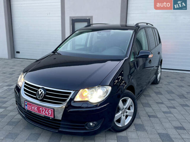 Чорний Фольксваген Туран, об'ємом двигуна 2 л та пробігом 292 тис. км за 8999 $, фото 24 на Automoto.ua