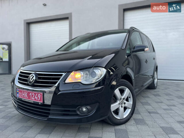 Чорний Фольксваген Туран, об'ємом двигуна 2 л та пробігом 292 тис. км за 8850 $, фото 13 на Automoto.ua