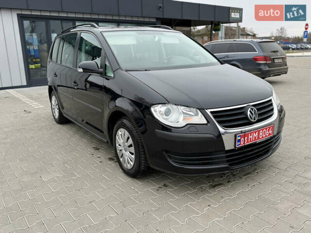 Черный Фольксваген Туран, объемом двигателя 1.4 л и пробегом 227 тыс. км за 7200 $, фото 29 на Automoto.ua