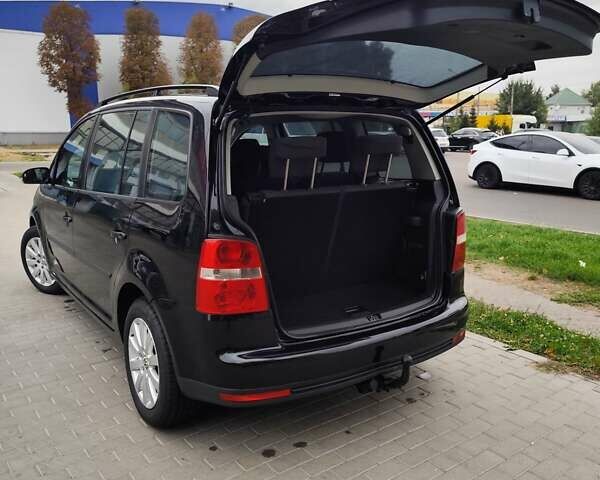 Чорний Фольксваген Туран, об'ємом двигуна 1.4 л та пробігом 194 тис. км за 6600 $, фото 37 на Automoto.ua