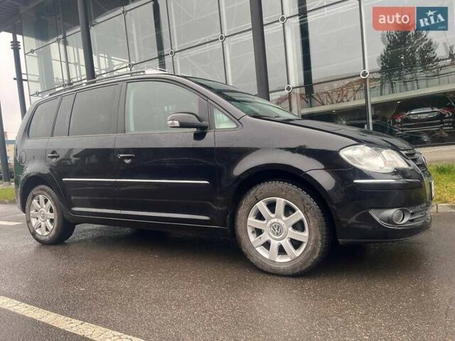 Черный Фольксваген Туран, объемом двигателя 2 л и пробегом 208 тыс. км за 7771 $, фото 15 на Automoto.ua