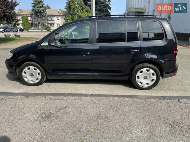 Чорний Фольксваген Туран, об'ємом двигуна 1.4 л та пробігом 192 тис. км за 7500 $, фото 4 на Automoto.ua