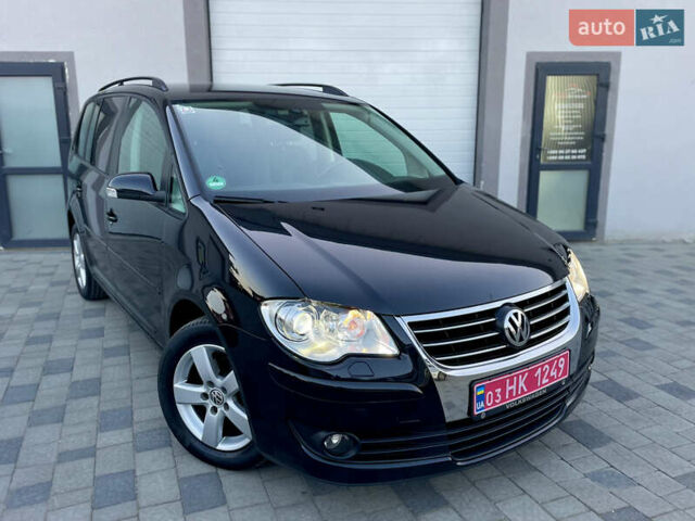 Чорний Фольксваген Туран, об'ємом двигуна 2 л та пробігом 292 тис. км за 8999 $, фото 6 на Automoto.ua