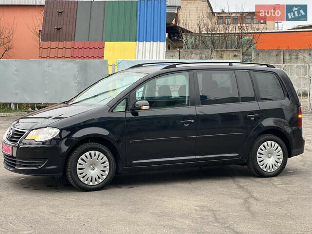 Черный Фольксваген Туран, объемом двигателя 1.6 л и пробегом 193 тыс. км за 7799 $, фото 6 на Automoto.ua