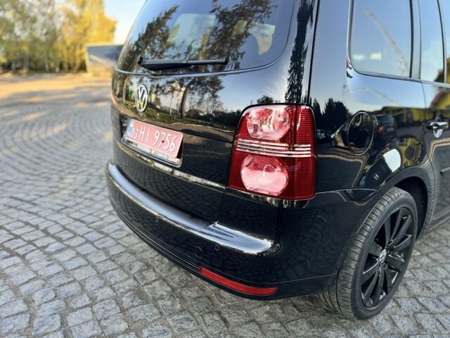 Черный Фольксваген Туран, объемом двигателя 1.4 л и пробегом 200 тыс. км за 7300 $, фото 3 на Automoto.ua