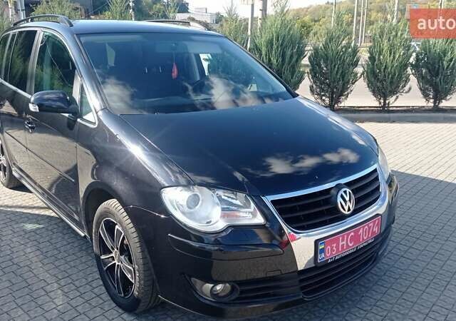 Чорний Фольксваген Туран, об'ємом двигуна 1.4 л та пробігом 216 тис. км за 7800 $, фото 41 на Automoto.ua