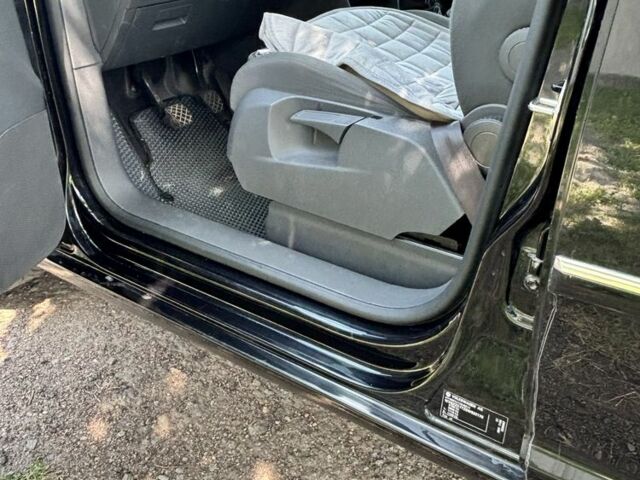 Черный Фольксваген Туран, объемом двигателя 1.4 л и пробегом 191 тыс. км за 8500 $, фото 12 на Automoto.ua