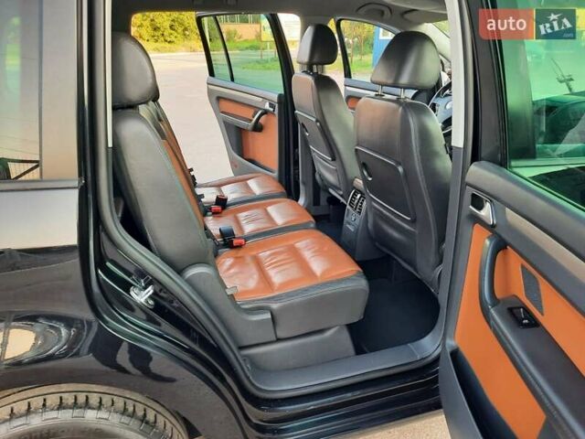 Черный Фольксваген Туран, объемом двигателя 1.6 л и пробегом 213 тыс. км за 8550 $, фото 159 на Automoto.ua