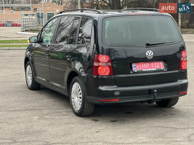 Черный Фольксваген Туран, объемом двигателя 1.6 л и пробегом 193 тыс. км за 7799 $, фото 23 на Automoto.ua
