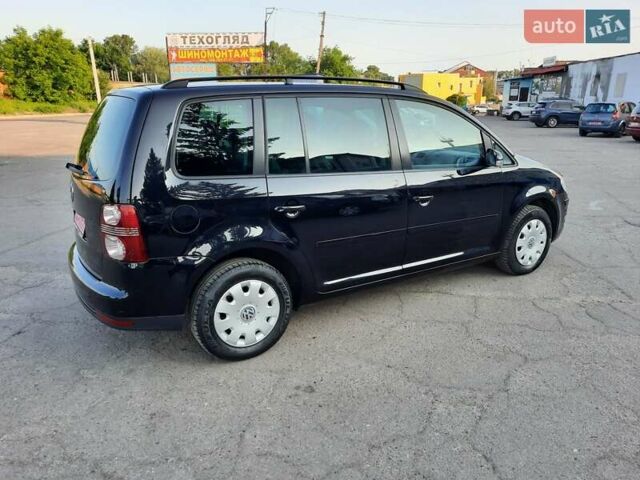Черный Фольксваген Туран, объемом двигателя 1.6 л и пробегом 213 тыс. км за 8550 $, фото 21 на Automoto.ua