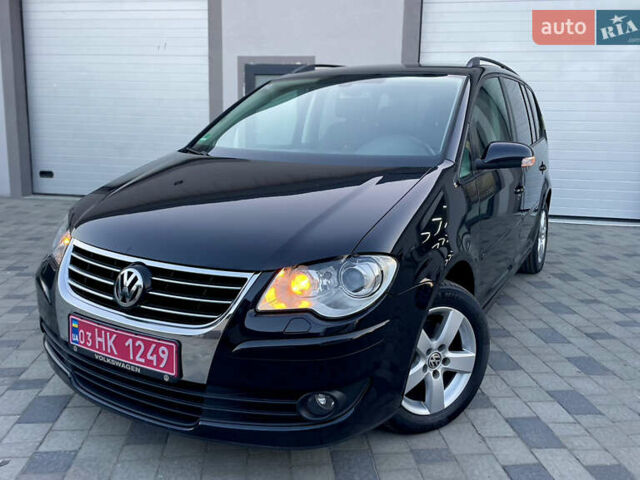 Чорний Фольксваген Туран, об'ємом двигуна 2 л та пробігом 292 тис. км за 8999 $, фото 1 на Automoto.ua