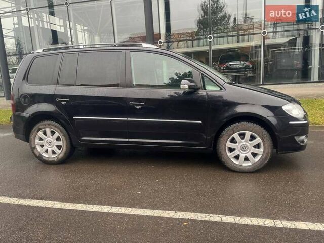 Черный Фольксваген Туран, объемом двигателя 2 л и пробегом 208 тыс. км за 7771 $, фото 3 на Automoto.ua